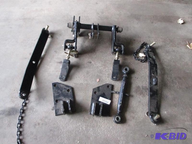 lot 17 image: 3 pt hitch setup for John Deere 455 mower, lo...