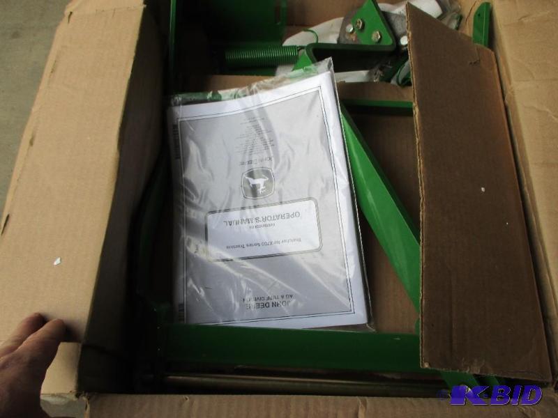 lot 21 image: John Deere Thatcher bracket mount kit, new bu...