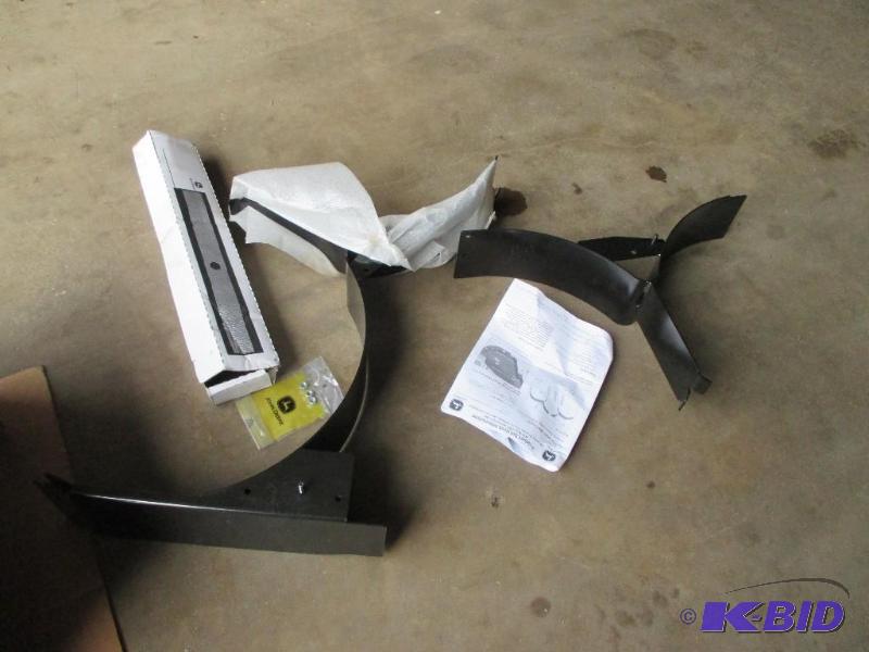 lot 22 image: New John Deere Mulcher kit for X 700 mower...