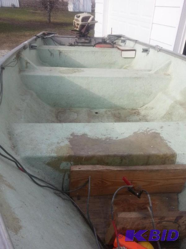 lot 4-1 image: This is a 1972 herters 14 foot fishing boat i...