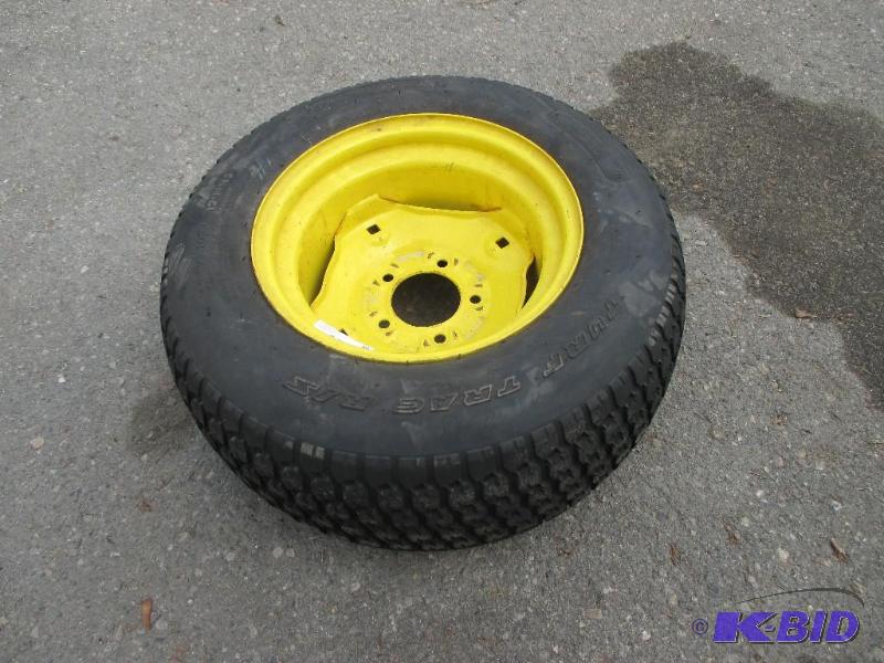 lot 50 image: Turf trac 23x10.50-12 tire on JD rim...