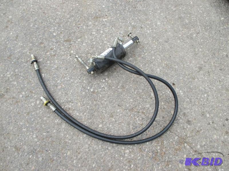 lot 63 image: John Deere quick hitch angling cylinder...