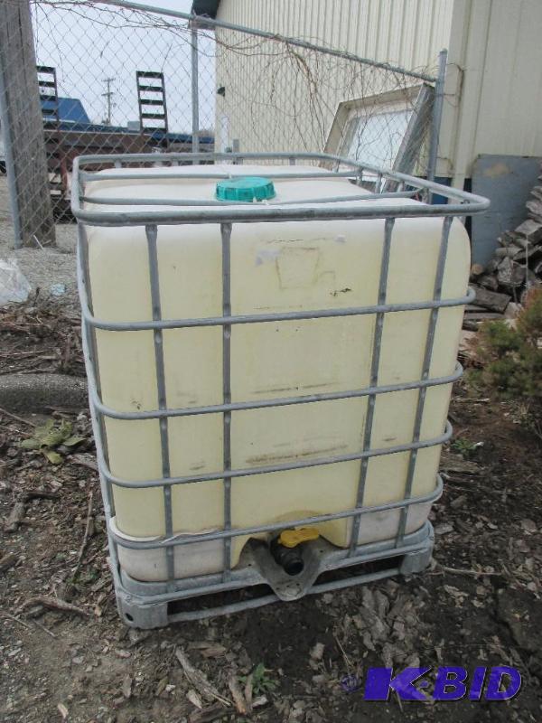 lot 67 image: Pallet mounted tank, had deicer in it, not wa...