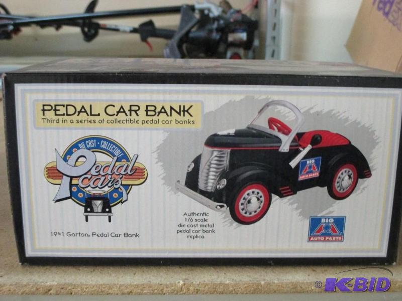 lot 57 image: NIB Pedal Car Bank...