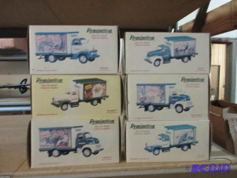 lot 82 image: NIB set of 6 remington collector trucks....