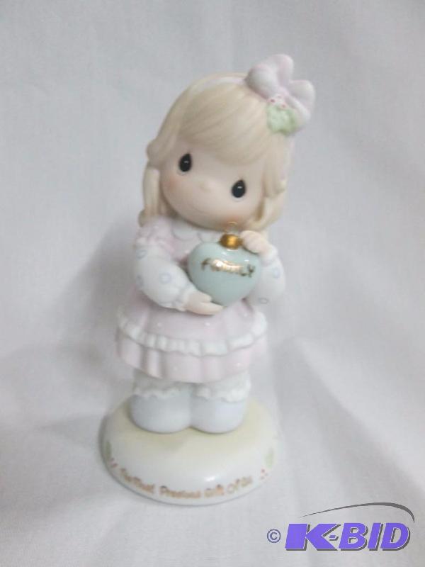 lot 10 image: Precious Moment Figurine