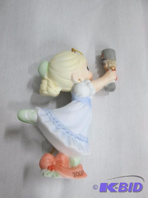 lot 33 image: Precious Moment Figurine