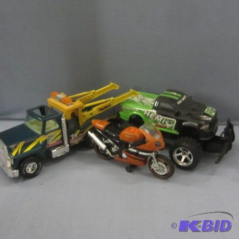 lot 176 image: Dodge, Kawasaki, Nylant Toys