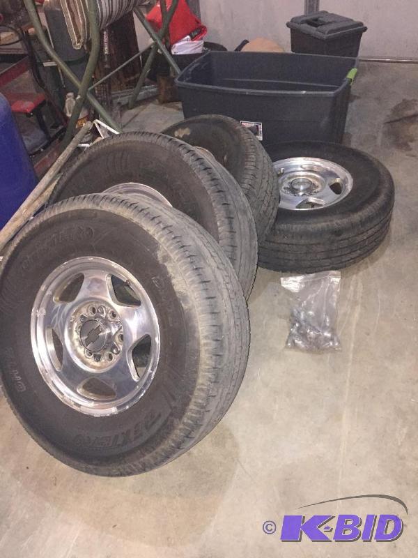 4 rims and tires from 1999 Chevy Tahoe, rare ...