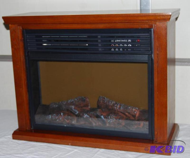 lot 28 image: Pro Fusion Rolling Infrared Fireplace With Ma...