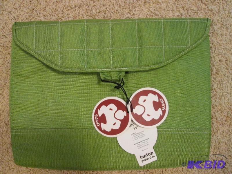 lot 23 image: Brand new SUMO laptop padded carrier in green...