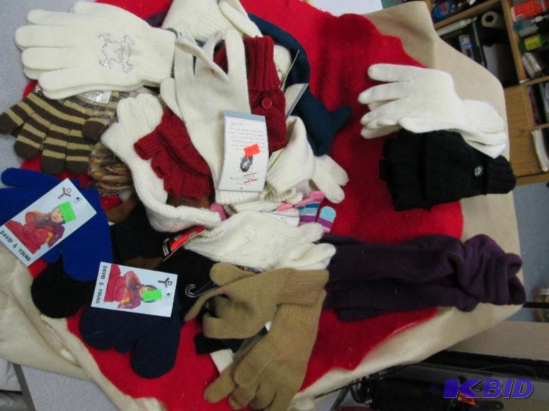 Assortment of winter gloves in different colo...