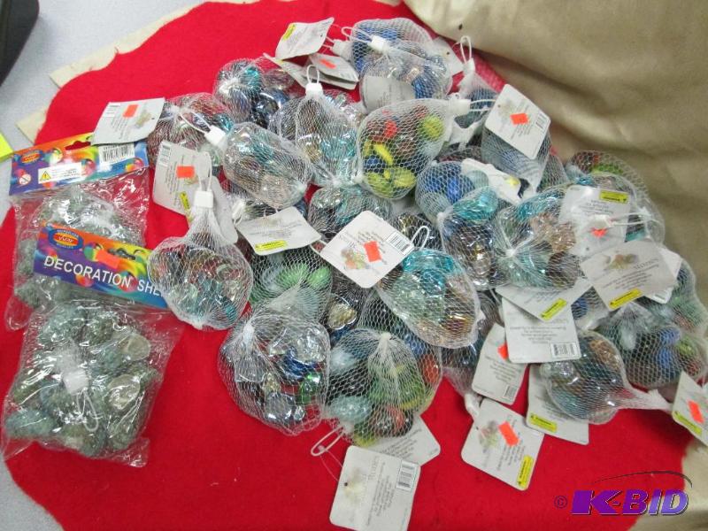 Assortment of decorative colored stones and d...