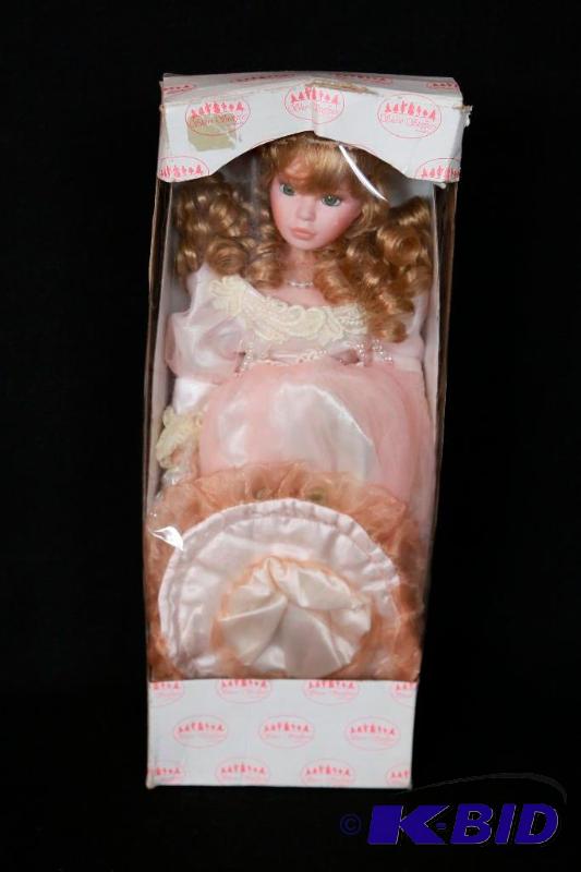 lot 254 image: Promenade Series Bisque Doll NIB