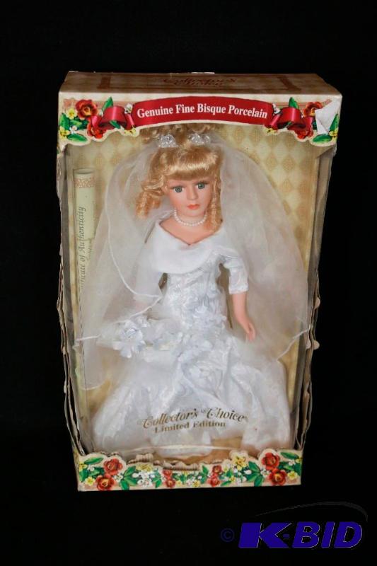 lot 255 image: Collectors Choice Bisque Doll NIB