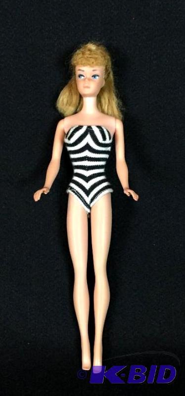 lot 3 image: 1962 Barbie Original Black & White Swimsuit