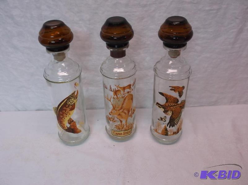 lot 123 image: Collectable wildlife decanter bottles appear ...
