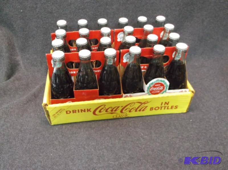lot 141 image: Vintage Coca-Cola unopened 6oz bottles full c...