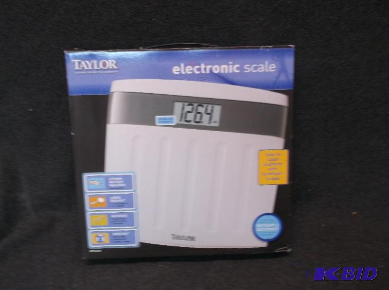 lot 144 image: Taylor bathroom scale appears new in box....