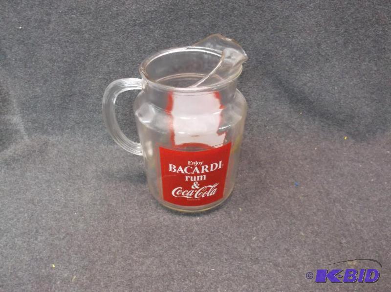 lot 151 image: Collectable Bacardi Rum and Coca-Cola pitcher...
