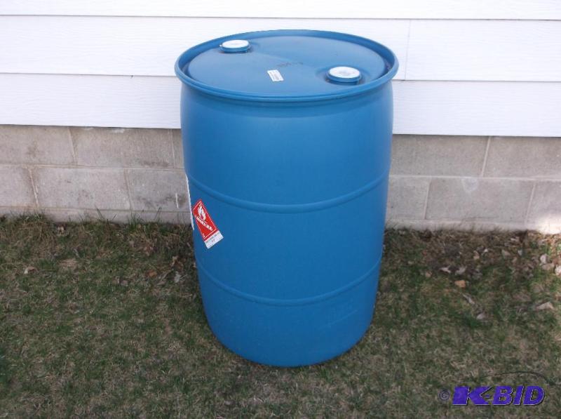 lot 180 image: Blue plastic 55 gal. food grade barrel with l...