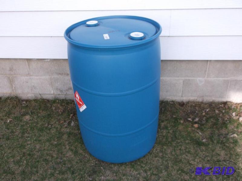 lot 182 image: Blue plastic 55 gal. food grade barrel with l...