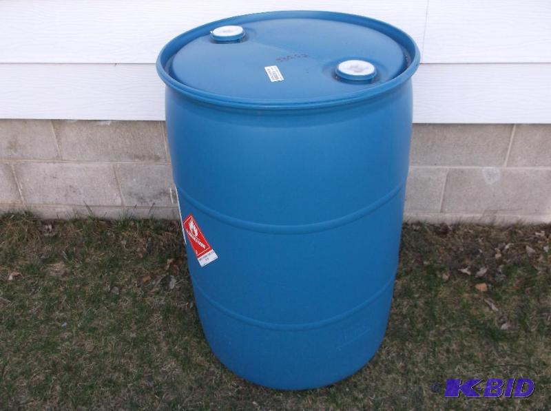 lot 183 image: Blue plastic 55 gal. food grade barrel with l...