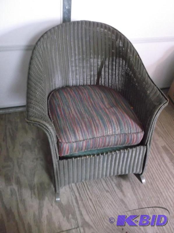 lot 59 image: Nice wicker cushioned rocking chair measuring...