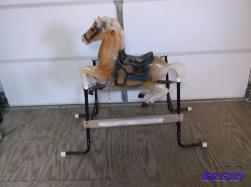 lot 67 image: Spring action rocking horse measuring 47 14&...