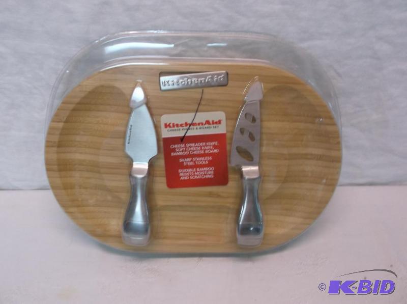 lot 77 image: Kitchen Aid cheese knifes and board set new i...