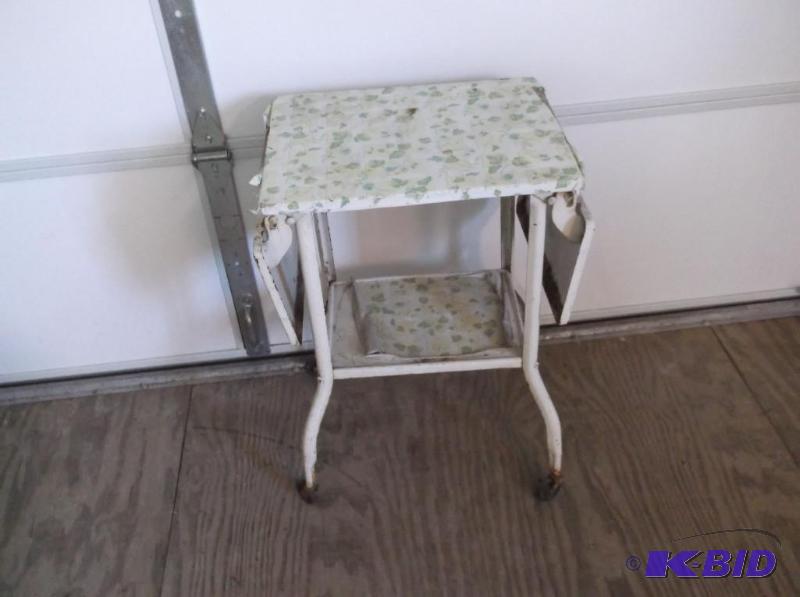 lot 96 image: Vintage metal drop leaf cart on castors has w...