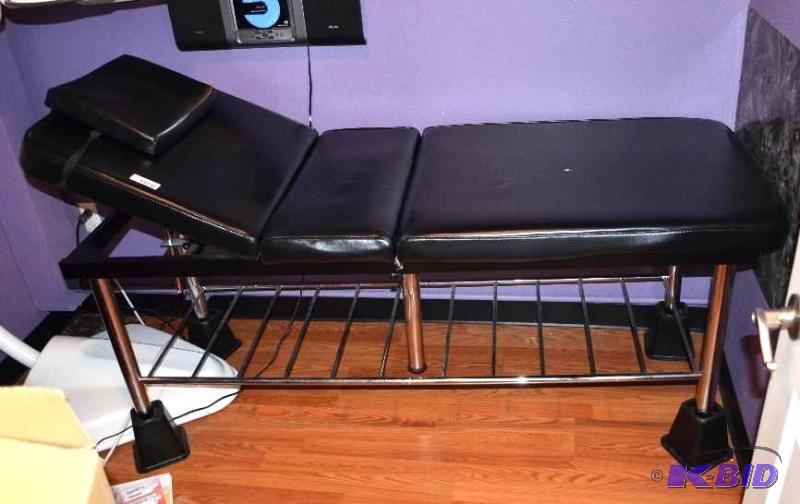lot 10 image: Adjustable padded Table 72x26". This tab...