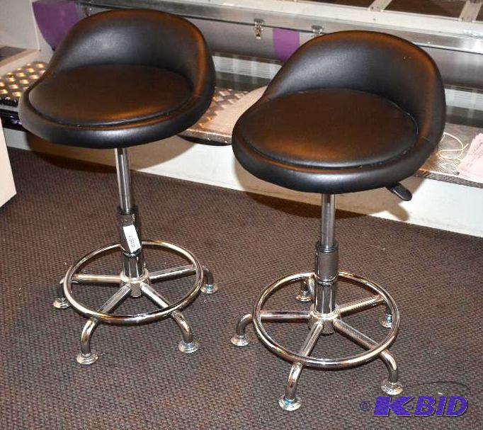 lot 105 image: Two heavy duty bar stools adjustable height...