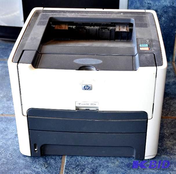 lot 123 image: HP Laser Jet 1320...
