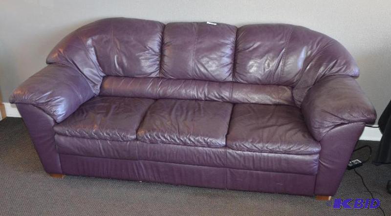lot 16 image: Leather Purple Couch 81" purchased new M...