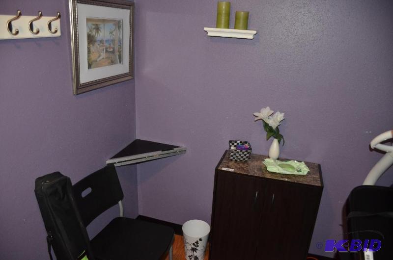 lot 52 image: Cabinet 36x24x12", chair, corner wall sh...