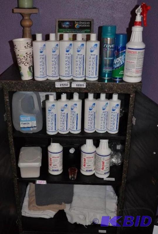 lot 64 image: The bottles of solution cost $12 each new. So...