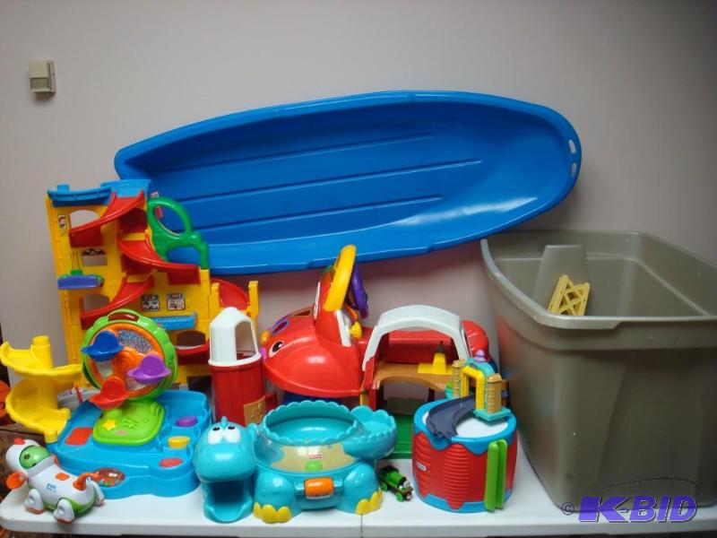 lot 126 image: Bin Filled With Toys, Some Fisher Price For P...