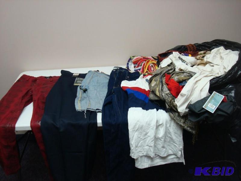 lot 141 image: Bag Filled With Clothes...