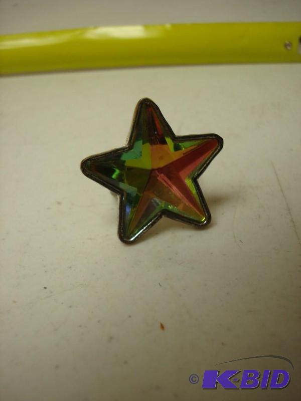 lot 166 image: Large Star Costume Ring...