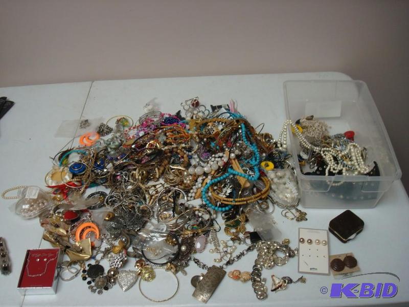 lot 168 image: Bin Filled With a Lot Of Costume Jewelry...