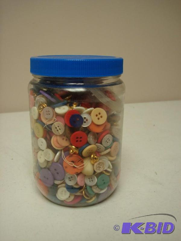 lot 185 image: Plastic Jar Filled With Buttons...