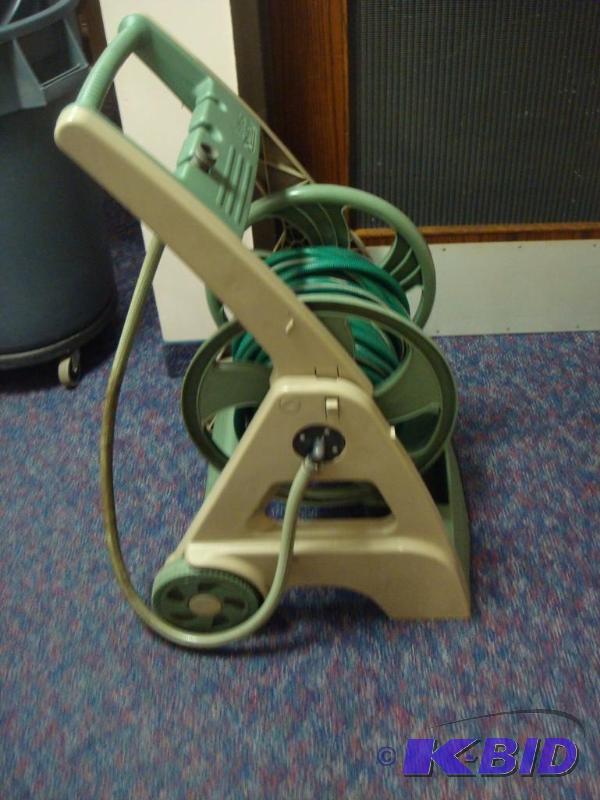 lot 38 image: Water Hose On Stand...