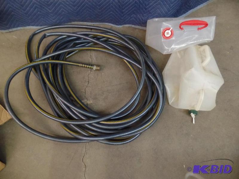 Hose & 2 Plastic Water Jugs