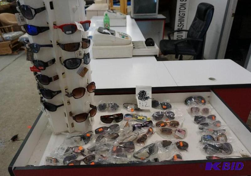 lot 112 image: Assorted Lot of Sunglasses and Display In New...