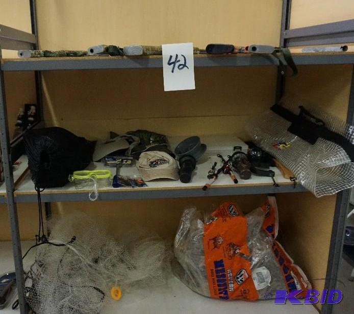 lot 42 image: 1 Lot of Assorted Toy Guns, Hats, Fishing Rod...