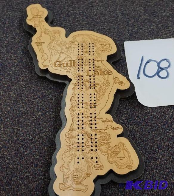 lot 108 image: Brainerd Lakes Area Gull Lake Shaped Wood Car...