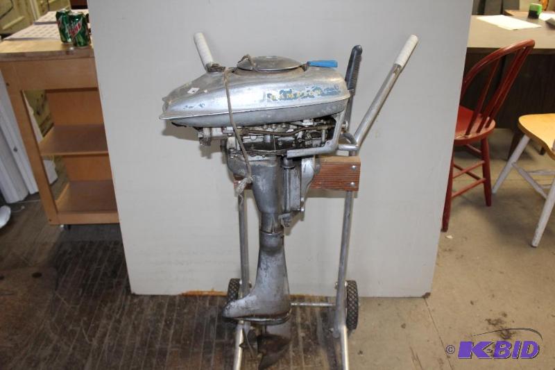lot 36 image: Champion 2 Cycle Boat Motor ...