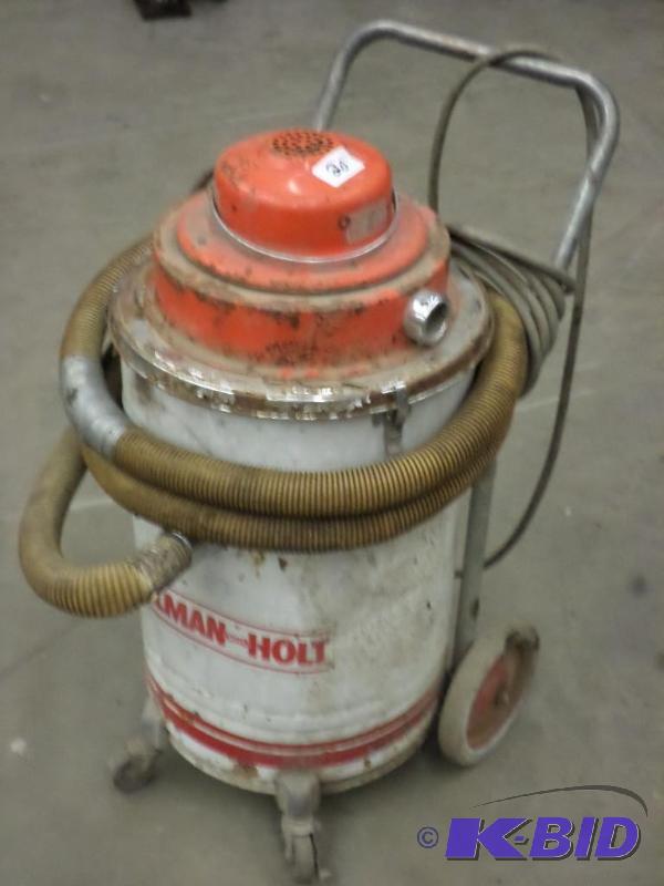 lot 20 image: White 16-Gallon 2HP Wheeled Vacuum...