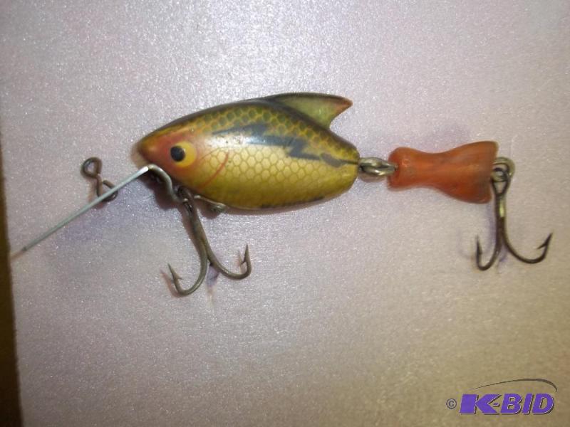 lot 111 image: Vintage Gold lure see photos for size and mor...